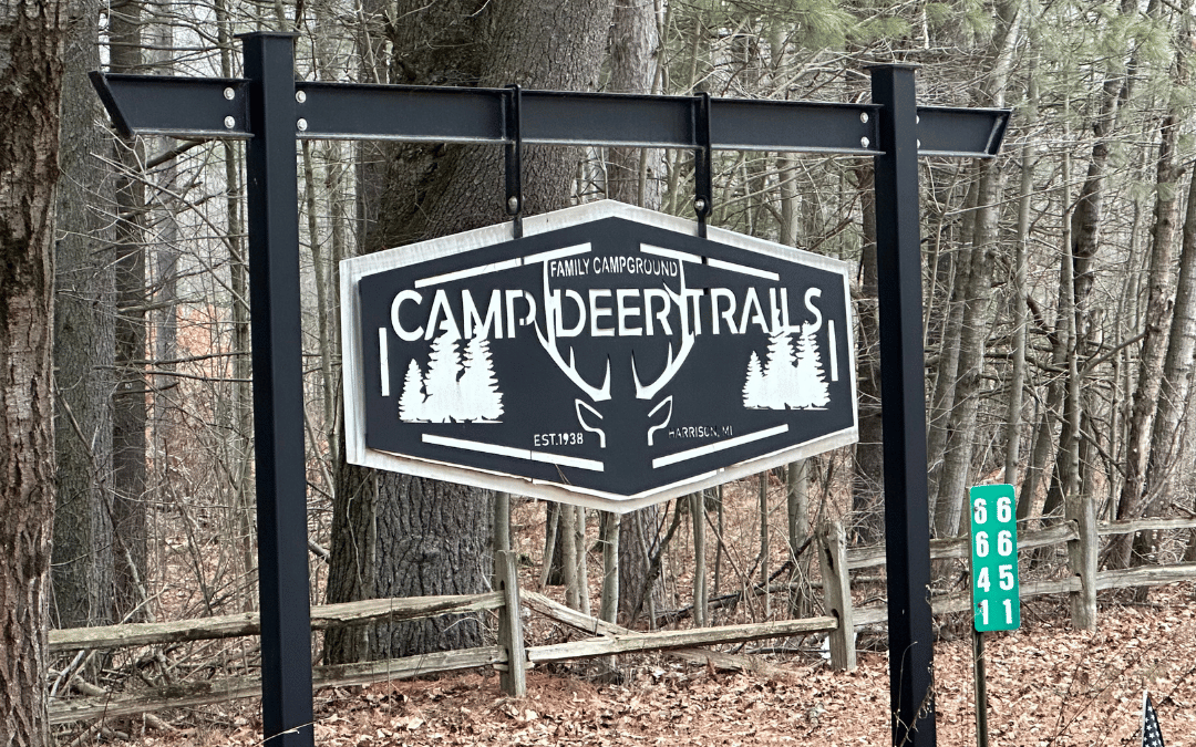 Camp Deer Trails sign
